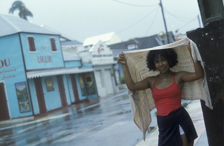 people go shoping bevor a tropical storm in the town of  St Gilles les Bains  on the Island of La Reunion in the Indian Ocean in Africa.のeditorial素材