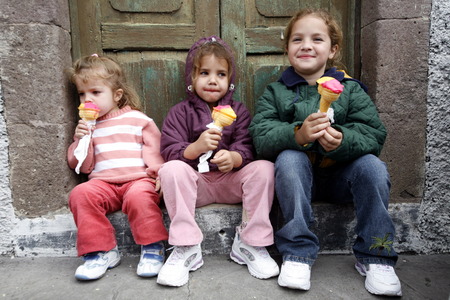 childern with a icecream in the mountain village of Tejeda in the center of the Canary Iceland of Spain in the Atlantic ocean.のeditorial素材