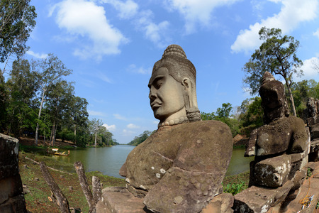 The Bridge at the Angkor Tom Gate in the Temple City of Angkor near the City of Siem Reap in the west of Cambodia.のeditorial素材