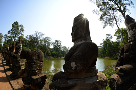The Bridge at the Angkor Tom Gate in the Temple City of Angkor near the City of Siem Reap in the west of Cambodia.のeditorial素材