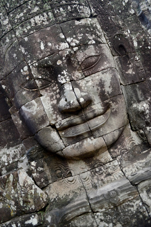 Stone Faces the Tempel Ruin of Angkor Thom in the Temple City of Angkor near the City of Siem Riep in the west of Cambodia.のeditorial素材