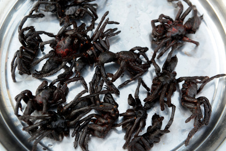 Spider as fast foodl in the City centre of Siem Riep neat the Ankro Wat Temples in the west of Cambodia.のeditorial素材