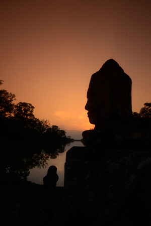 The Bridge at the Angkor Tom Gate in the Temple City of Angkor near the City of Siem Riep in the west of Cambodia.のeditorial素材