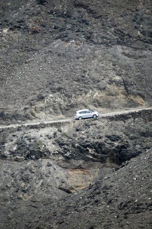 The Road in the Jandia Natural Parc on the south of the Island Fuerteventura on the Canary island of Spain in the Atlantic Ocean.のeditorial素材
