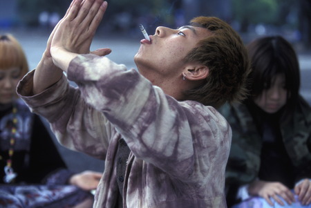 the revolucionary Rainbow Kids in a squre in the City center of Tokyo in Japan in Asia,のeditorial素材