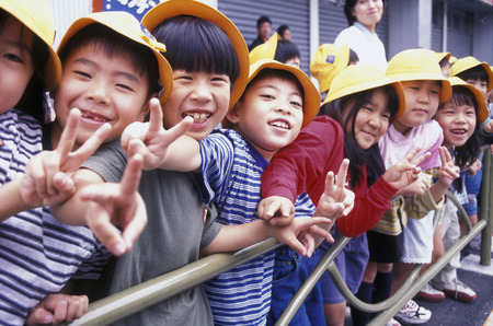 childern on the streets in the City center of Tokyo in Japan in Asia,のeditorial素材