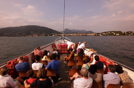 The Tourist Boat near the old town of Pallanza near to Verbania on the Lago Maggiore in Lombardia in the north Italy.のeditorial素材