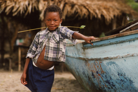 a boy at the Beach of Tela near San Pedro Sula on the caribian sea in Honduras in Central America,のeditorial素材