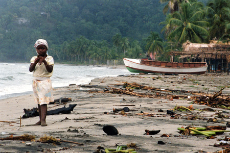 a girl at the Beach of Tela near San Pedro Sula on the caribian sea in Honduras in Central America,のeditorial素材