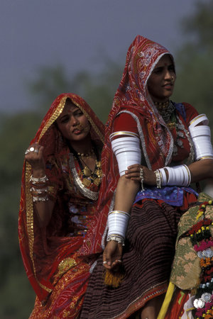 women at the kamel Festival in the town of Bikaner in the province Rajasthan in India.