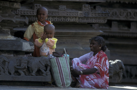 a family at the Temple of the Village of Hampi in the province of Karnataka in India.のeditorial素材