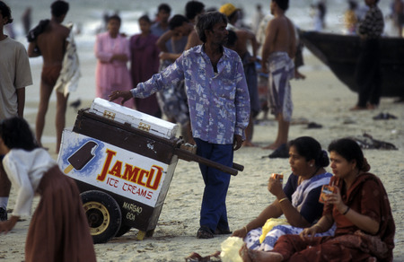 Indian Tourists at the beach of Colva in the Province Goa in India.のeditorial素材