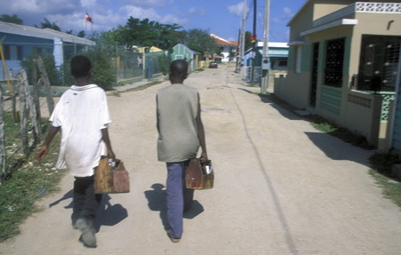 shoe cleaner at the Village of Las Terrenas on Samanaon in The Dominican Republic in the Caribbean Sea in Latin America.のeditorial素材