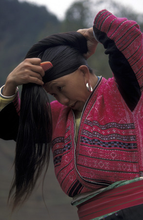 a farmer women in the rice fields of the village of Longsheng in Guangxi province in the south of China.のeditorial素材