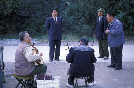 muisic players on the streets in the city of Beijing in the east of china in east asia.のeditorial素材