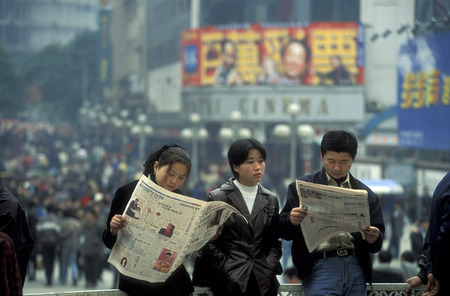 people at the main square in the city of Chongqing in the province of Sichuan in China in east asia.のeditorial素材