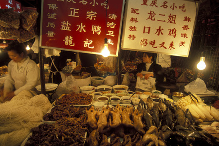 people on the streets of Chongqing Market in the province of Sichuan in China in east asia.のeditorial素材
