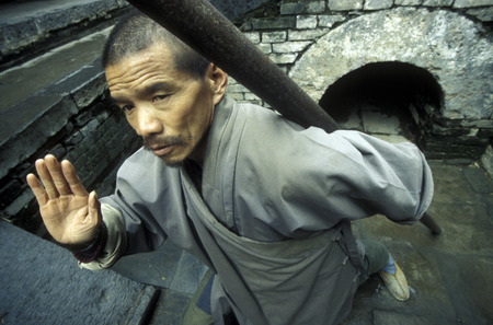 Shaolin monk at the Shaolin Monestry in the town of Shaolin in the province of Henan in China in east asia.のeditorial素材