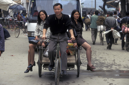 a bicycle transportation in the City of Shanghai in China in east asia.のeditorial素材