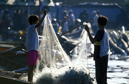 a fishing harbor at the coast of the Town of Sihanoukville in cambodia in Southeastasia.のeditorial素材