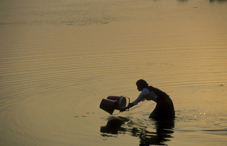 a women take water from the lake at the Prasat Prei temple in Angkor at the town of Siem Reap in cambodia in Southeastasia.のeditorial素材