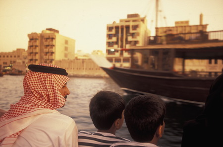 a city boat and ferry on the Dubai creek in the old town in the city of Dubai in the Arab Emirates...