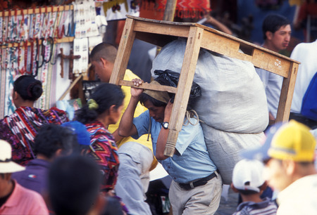 people in traditional clotes at the Market in the Village of  Chichi or Chichicastenango in Guatemala in central America.のeditorial素材