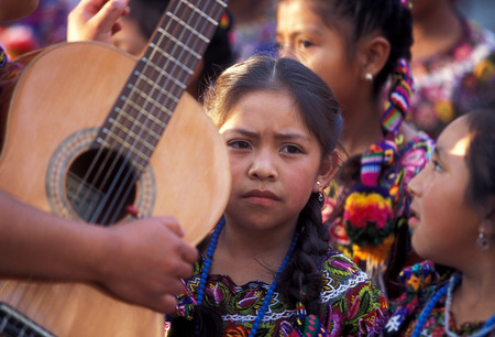 childer at a dance shoe in the old town in the city of Antigua in Guatemala in central America.のeditorial素材