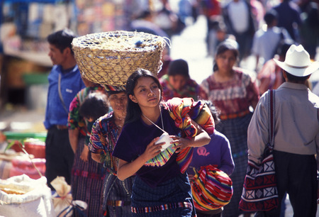 people in traditional clotes at the Market in the Village of  Chichi or Chichicastenango in Guatemala in central America.のeditorial素材