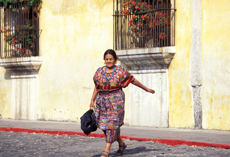 a indio women in the old town in the city of Antigua in Guatemala in central America.のeditorial素材