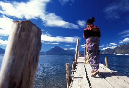 The Lake Atitlan mit the Volcanos of Toliman and San Pedro in the back at the Town of Panajachel in Guatemala in central America.のeditorial素材