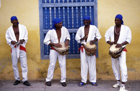 a salsa Band in the old Town of the Village of trinidad on Cuba in the caribbean sea.