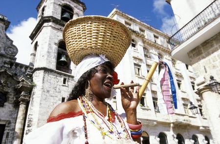 a women at the Plaza de la Catedral in the old town of the city Havana on Cuba in the caribbean sea.のeditorial素材