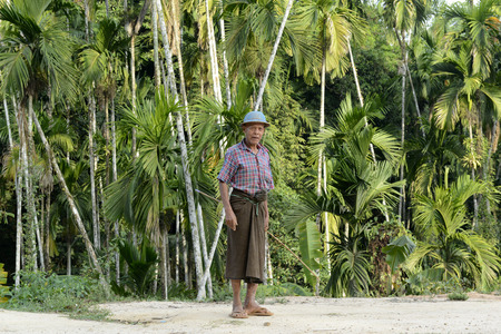 a farmer in a village near the city of Myeik in the south in Myanmar in Southeastasia.のeditorial素材