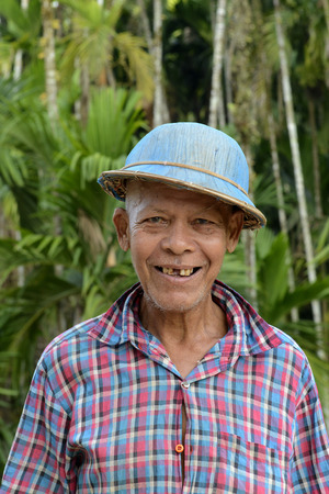 a farmer in a village near the city of Myeik in the south in Myanmar in Southeastasia.のeditorial素材