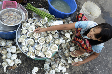 a smal streetmarket in the city of Myeik in the south in Myanmar in Southeastasia.のeditorial素材