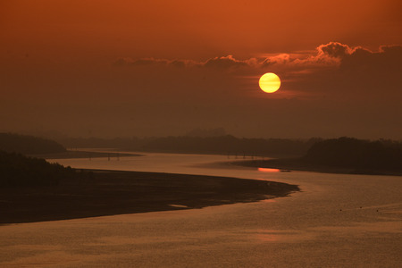 a river by sunrise near the city of Myeik in the south in Myanmar in Southeastasia.の写真素材