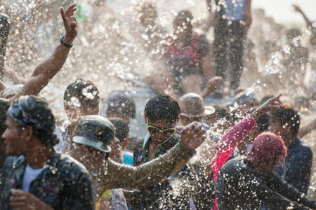People at the Waterparty at the Thingyan Water Festival at the Myanmar New Year in the city centre...