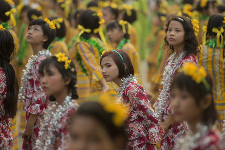 Traditional Dance Girls at the Thingyan Water Festival at the Myanmar New Year in the city centre of Mandalay in Manamar in Southeastasia.のeditorial素材