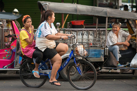 Bicycle Ricksha Taxis at the morning Market in Nothaburi in the north of city of Bangkok in Thailand in Southeastasia.のeditorial素材