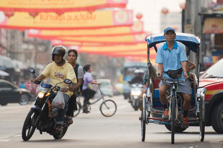 Bicycle Ricksha Taxis at the morning Market in Nothaburi in the north of city of Bangkok in Thailand...