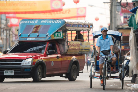 Bicycle Ricksha Taxis at the morning Market in Nothaburi in the north of city of Bangkok in Thailand...