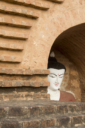 a Buddha figure in a Pagoda in Bagan in Myanmar in Southeastasia.の写真素材