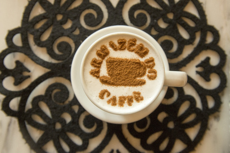 a coffee cappucchino in a coffee shop in the city centre of Porto in Porugal in Europe.のeditorial素材