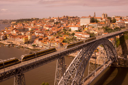 the Ponte de Dom Luis 1 at the old town on the Douro River in Ribeira in the city centre of Porto in...