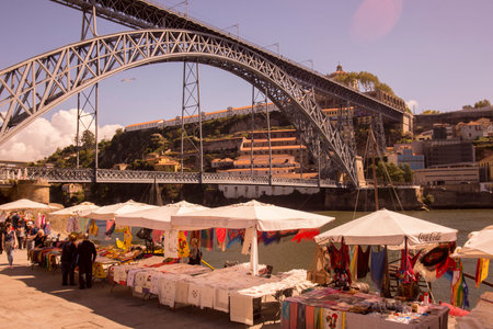 the Ponte de Dom Luis 1 at the old town on the Douro River in Ribeira in the city centre of Porto in...