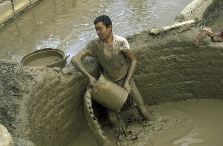 workers in a pottery factory in the old town of Cairo the capital of Egypt in north africa