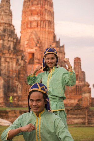 traditional People at the Wat chai wattanaram in the city of Ayutthaya north of bangkok in Thailand in southeastasia.のeditorial素材