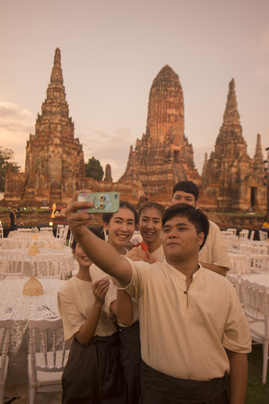 traditional People at the Wat chai wattanaram in the city of Ayutthaya north of bangkok in Thailand in southeastasia.のeditorial素材