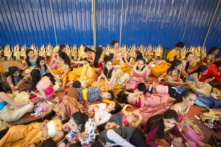 Traditional Thai Dance Girls at the Elephant Round-up Festival in the city of Surin in Northeastern Thailand in Southeastasia.のeditorial素材